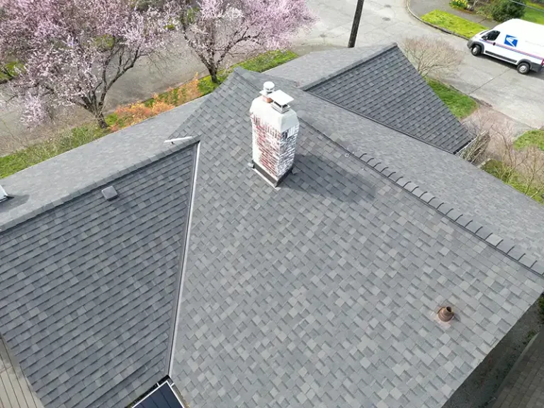 Close up view of top roof details of a home with a New Composite Shingle Roof in Seattle, Washington