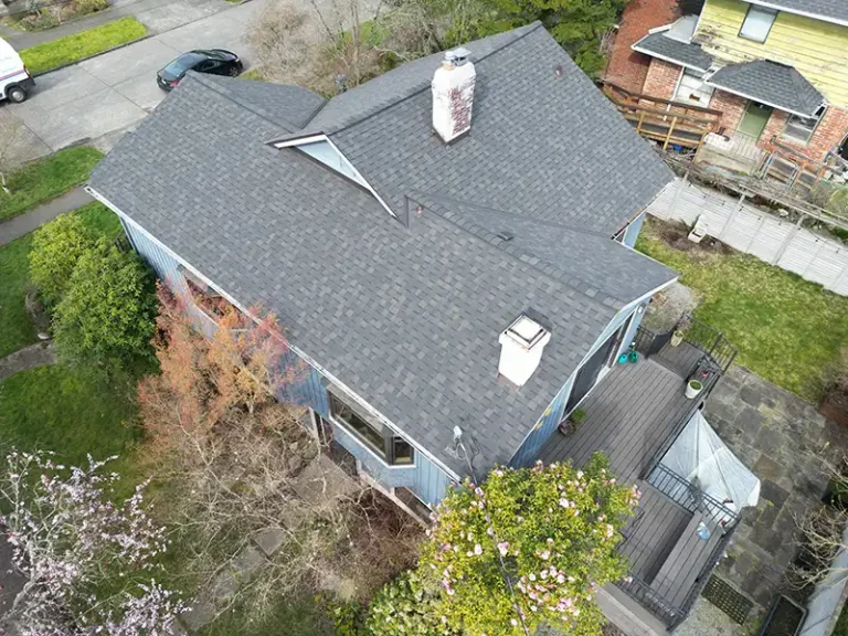 View of top roof details of a home with a New Composite Shingle Roof in Seattle, Washington